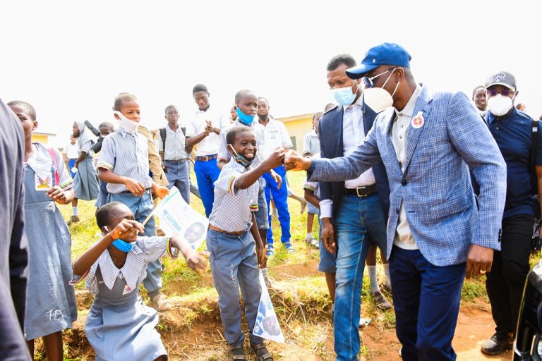 Sanwo-Olu greets a student at Ikorodu Model College