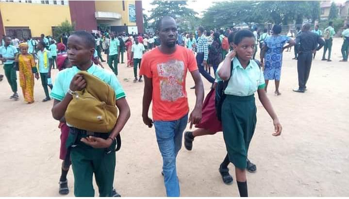 Ojodu Grammar School students leaving the school after it was shutdown by the government