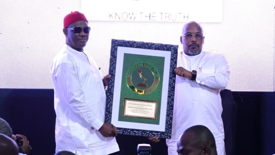 Governor of Rivers State, Nyesom Ezenwo Wike (left) receiving the ThisNigeria, "Gold Prize for Exceptional Leadership, " from the Publisher of ThisNigeria Media Newspaper, Mr. Eric Osagie (right) in Abuja on Wednesday.