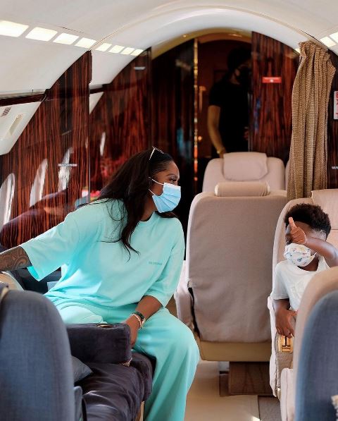 Savage and her son in Ghana