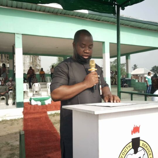 Rivers State Coordinator of NYSC, George Mfongang, reading the address of DG NYSC on the occasion of the terminal parade/closing ceremony of 2021 Batch C Stream 2 orientation course exercise at Nonwa,Tai LGA,Rivers State.c