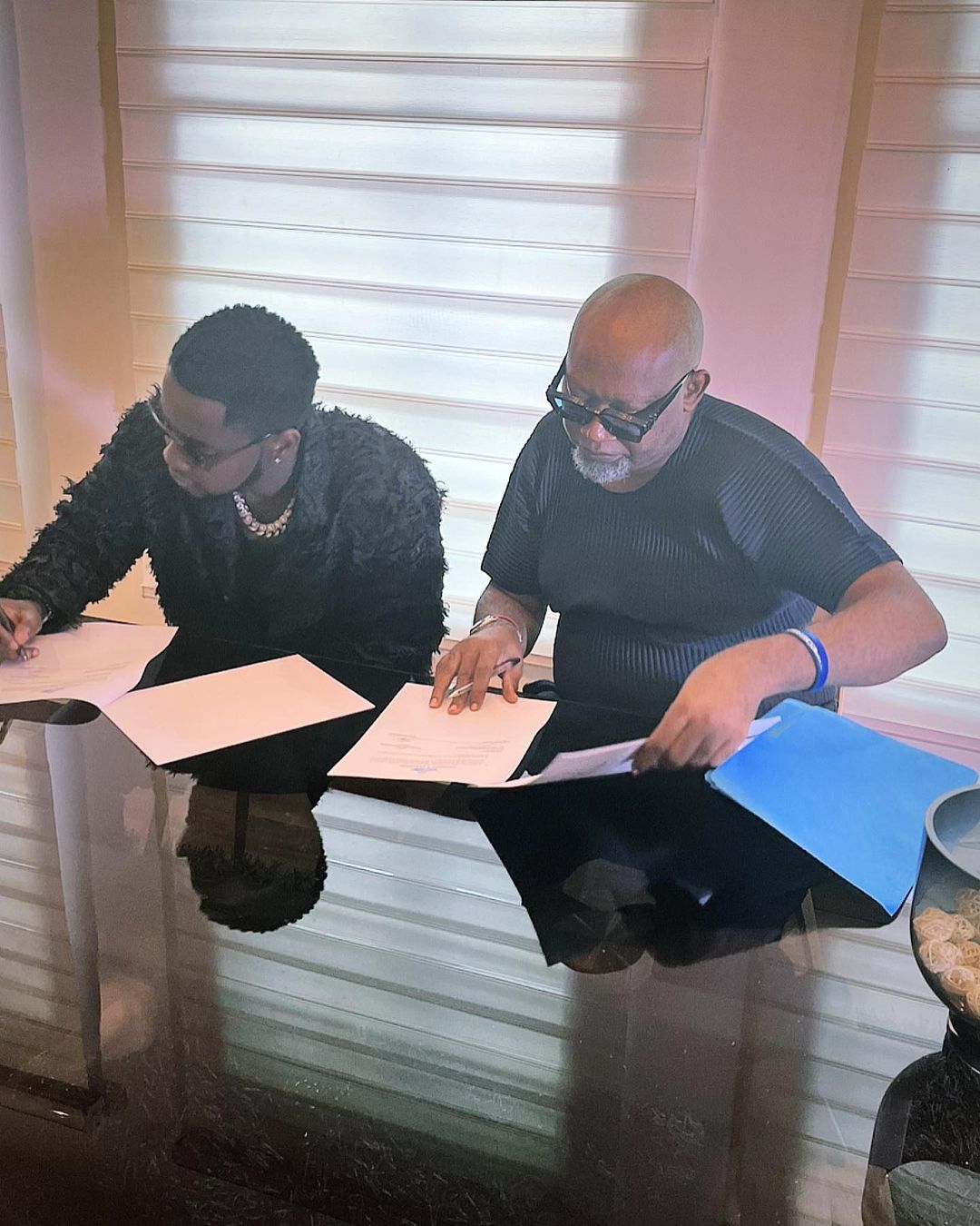 Kizz Daniel signs new management deal with Paul Okoye
