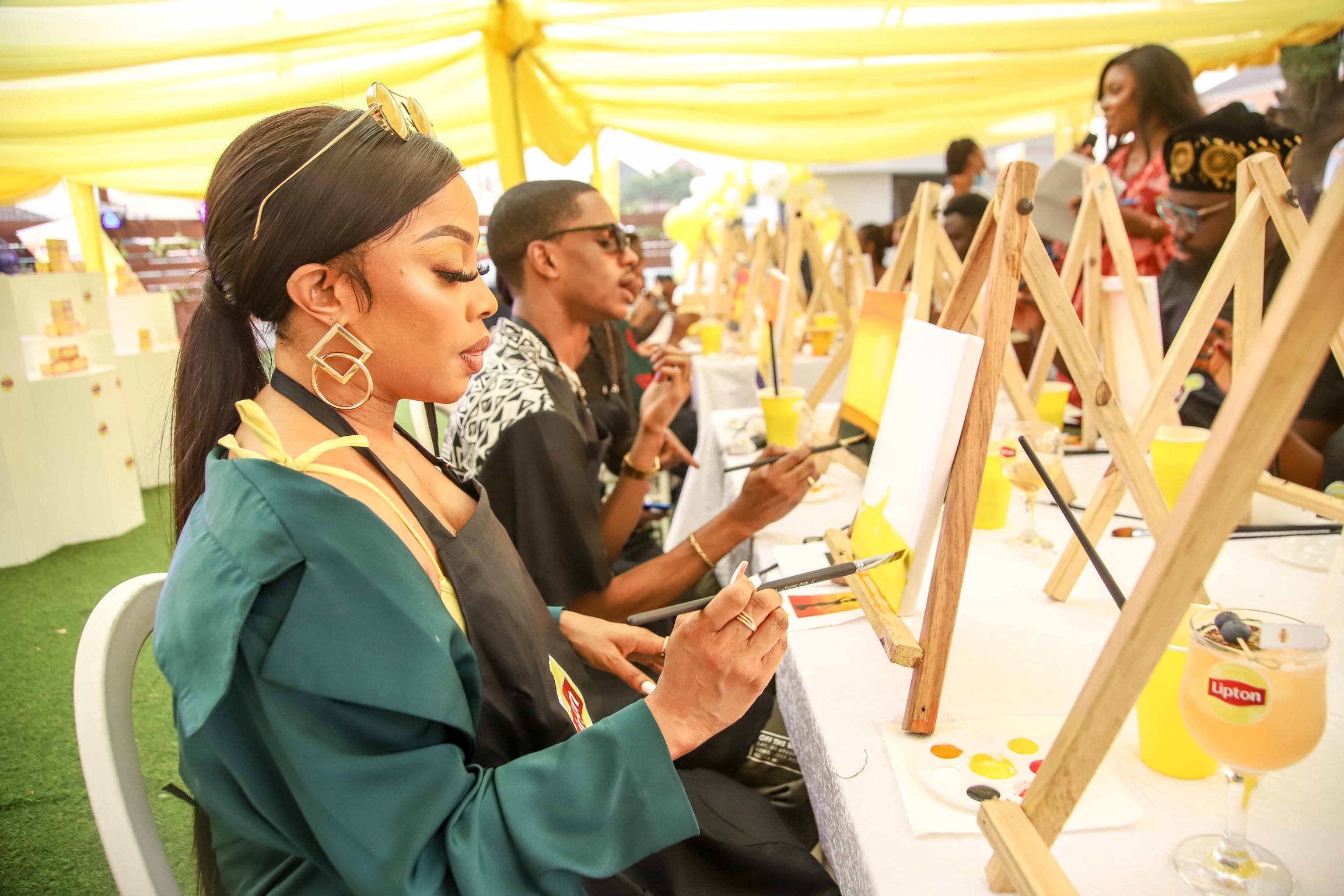 Toke Makinwa and Denola Grey sip and paint at the launch of the new Lipton teabags.jpg