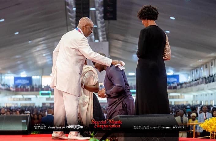 Oyedepo, with his wife praying for Brume and her coach