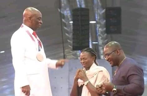 Oyedepo praying for the duo