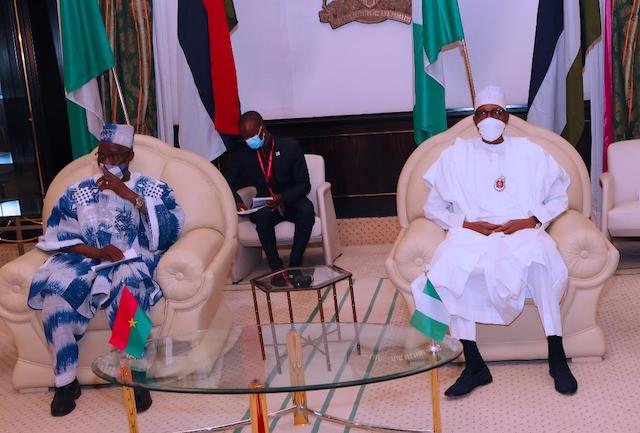 Buhari with ambassador Piabie Firmin Gregoire N'DO settle down for talks