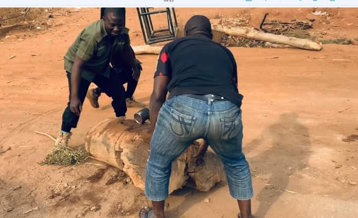 Log used for illegal road blocks being removed on the orders of Kogi governor, Yayaha Bello