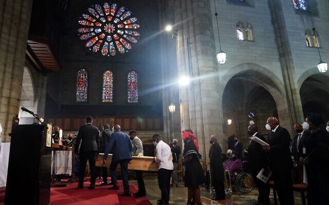 Family members with  the coffin of South African anti-Apartheid icon Archbishop Desmond Tutu during the requiem mass of Tutu at St. Georges Cathedral in Cape Town
