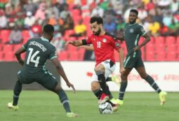 Super Eagles’ forward, Iheanacho shadows Egypt’s Mo Sallah during Nigeria’s first match in ongoing AFCON 2021
