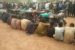 The suspects arrested by the police during the raid on Jigawa and some of the items recovered from the hideout