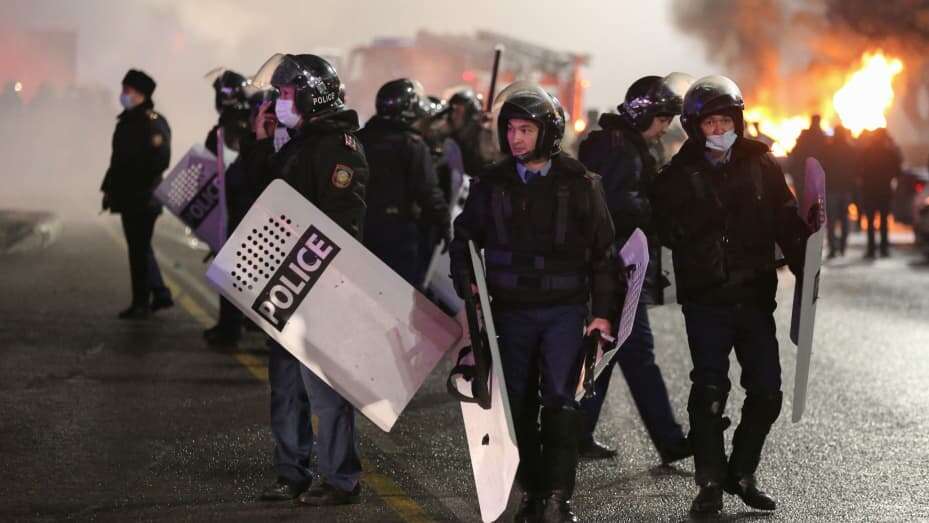 Police in Kazakhstan batting protesters
