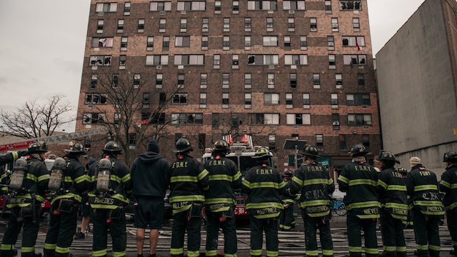 New York City Firefighters at the scene of the apartment fire in Bronx