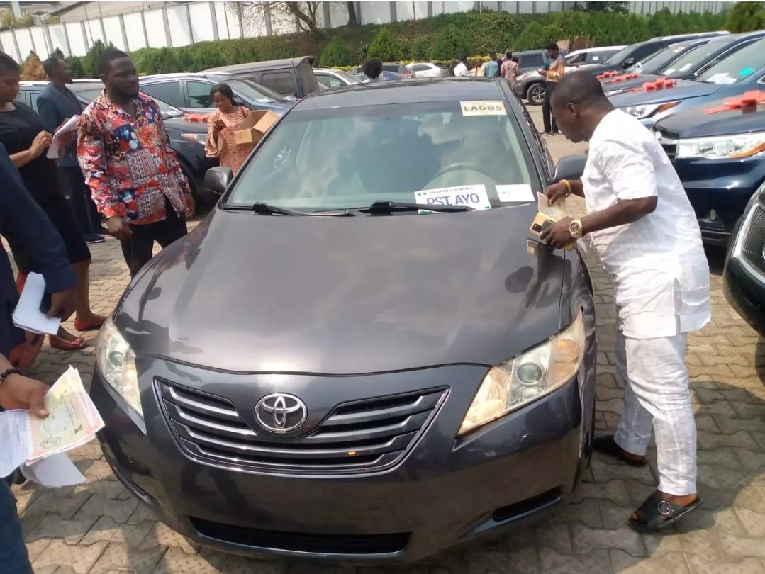 A pastor with his car