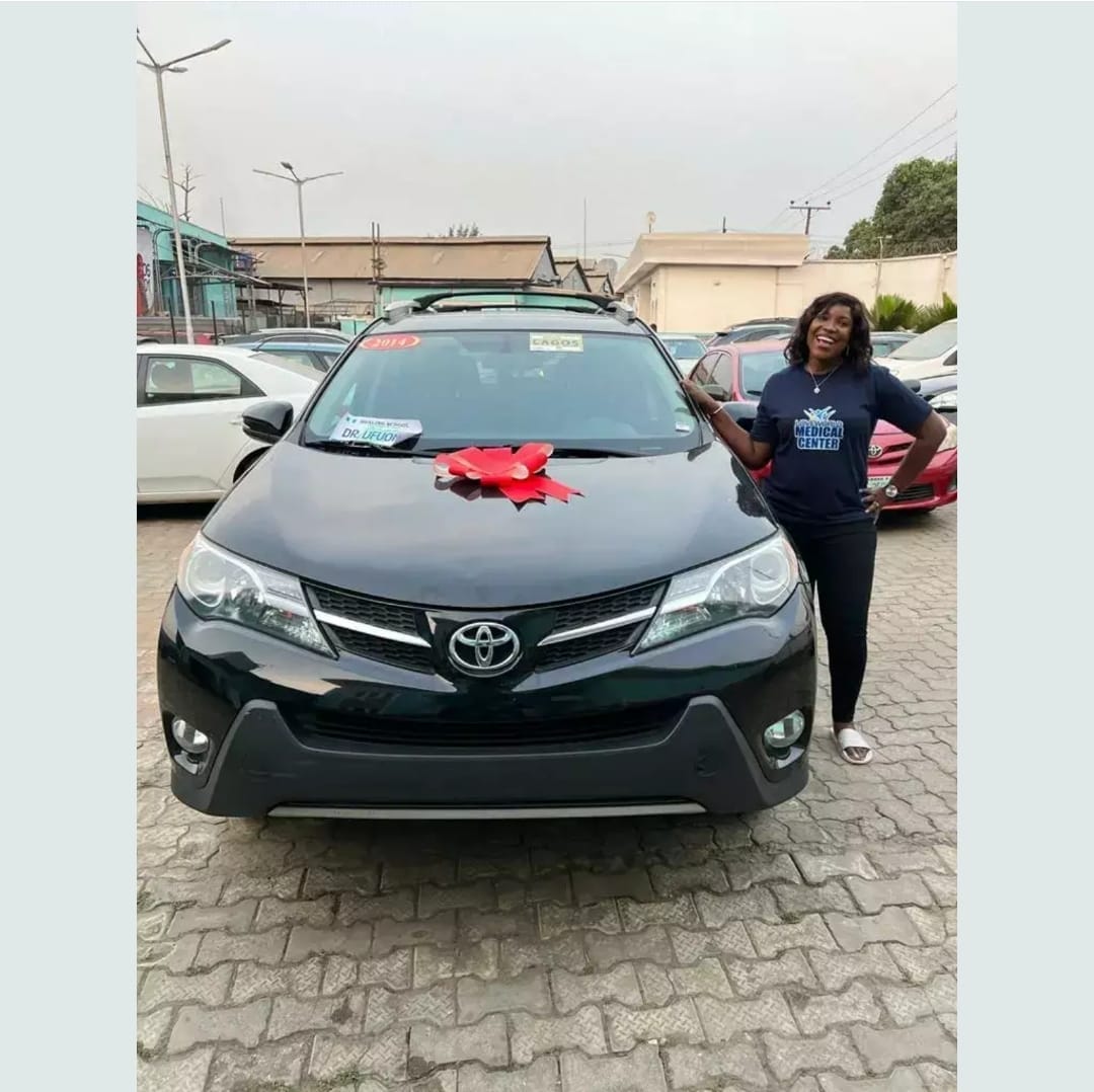 Another staff with her car