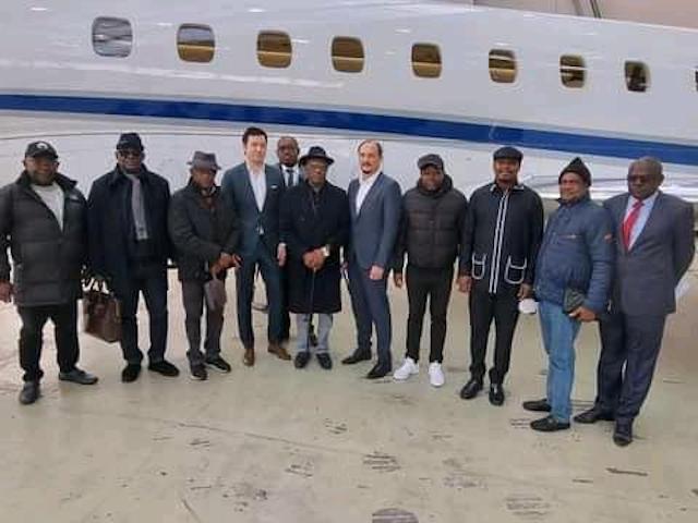 Wike, middle, with state and General Atomics Aerotec in Munich officials. The Embraer Legacy 600 is in background