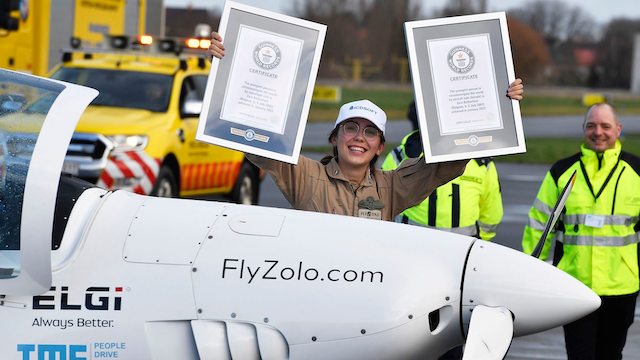 Zara Rutherford with her Guinness World record certificates