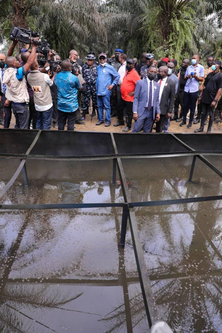Governor Wike and others at the site of illegal refinery in Rivers on Thursday