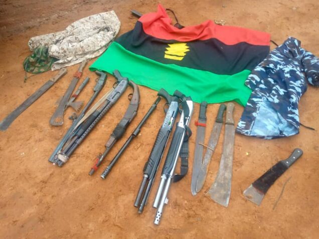 Gun and flag of Biafra recovered by troops from IPOB/ESN stronghold in Lilu forest