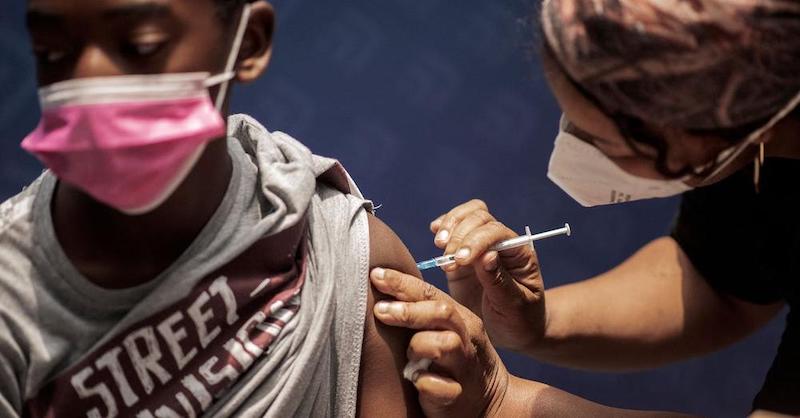 A South African being vaccinated