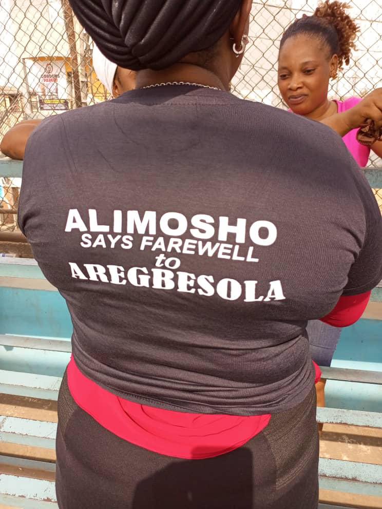 A woman wears a T-shirt with message for Aregbesola