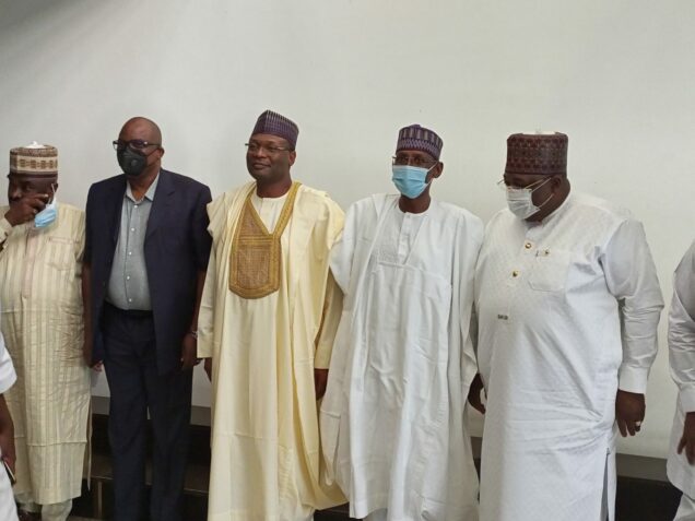 3rd from left: Chairman of INEC, Prof. Mahmood Yakubu and FCT Minister, Malam Muhammad Bello,   at the FCT Expanded Stakeholders Security meeting on FCT Council election  Administration on Thursday, in Abuja.