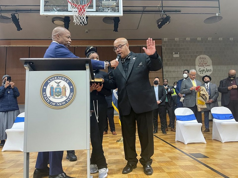 New York State Assembly member and former convict who served time for manslaughter, Eddie Gibbs, is sworn into office by New York City mayor Eric Adams at the Johnson Houses in Manhattan borough of New York City, New York, U.S. February 10, 2022. REUTERS/Dan Fastenberg