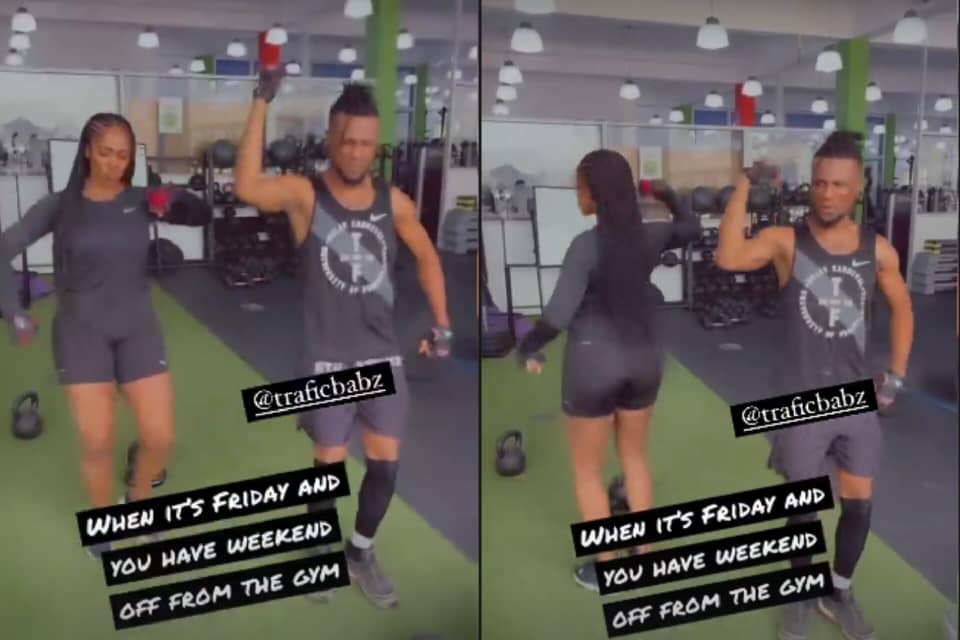 The singer dancing with her partner at the gym