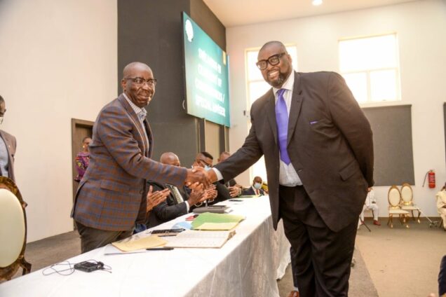 Governor Godwin Obaseki congratulating one of the new appointees sworn in on Wednesday