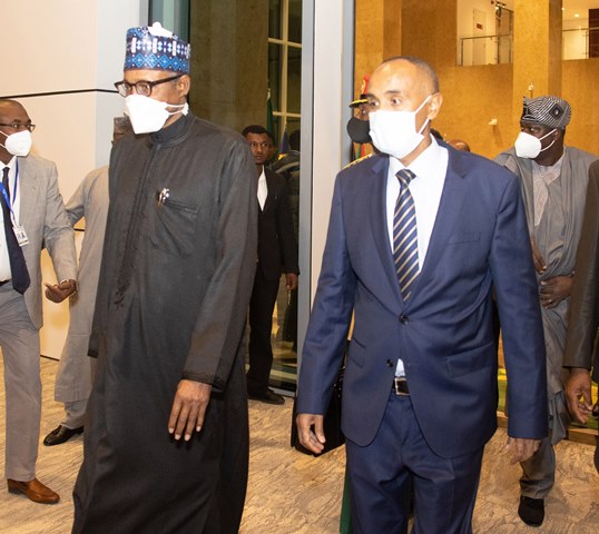 Buhari and the Ethiopian Minister of Education, Prof  Berhanu Nega on arrival for the 35th Ordinary Session of the Assembly of the Africa Union Heads of State and Government in Addis Ababa, Ethiopia. 