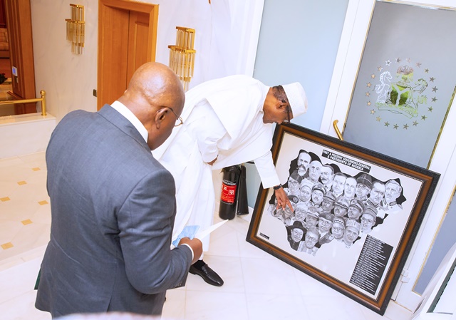 Nigerian president showing Akufo-Addo past presidents of the nation