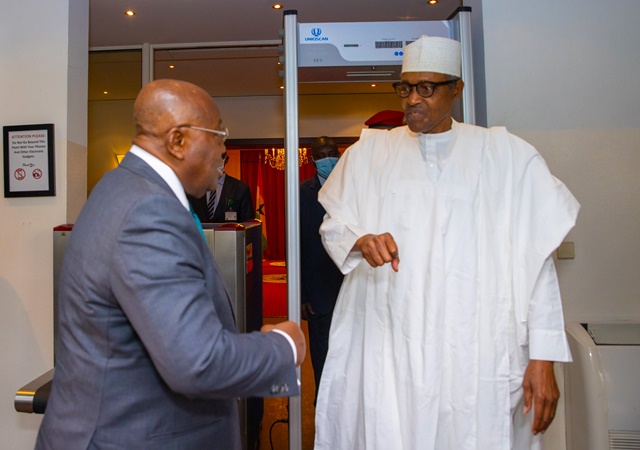 Buhari and Akufo-Addo exhanging pleasantries 
