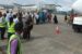 Passengers queue to board a flight in Lagos