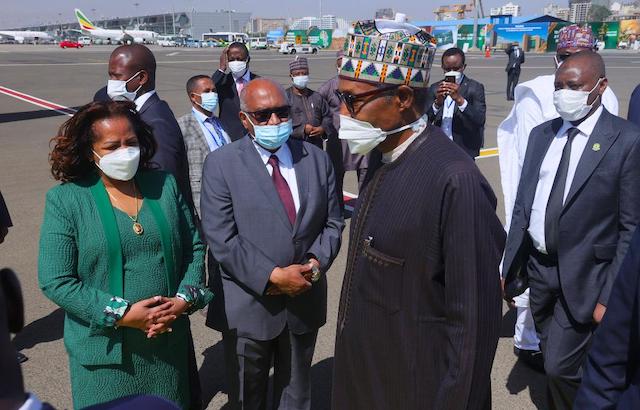 President Muhammadu Buhari being seen off by Ethiopia Minister of Water; Irrigation and Energy; Dr. Seleshi Bekele