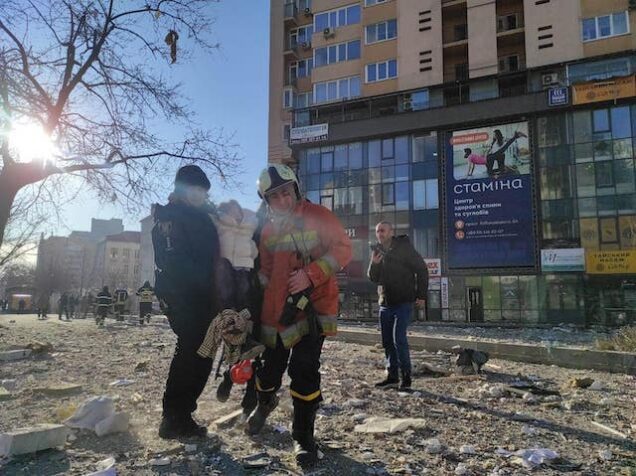 Resident of a bombed apartment being evacuated in Ukraine. CNN photo