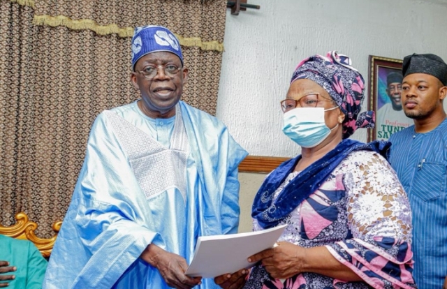 Tinubu with the widow of Prof. Samuel