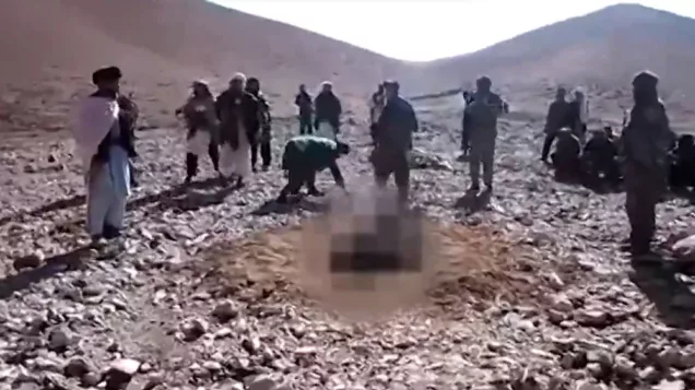 FILE PHOTO: A woman being stoned to death in Afghanistan