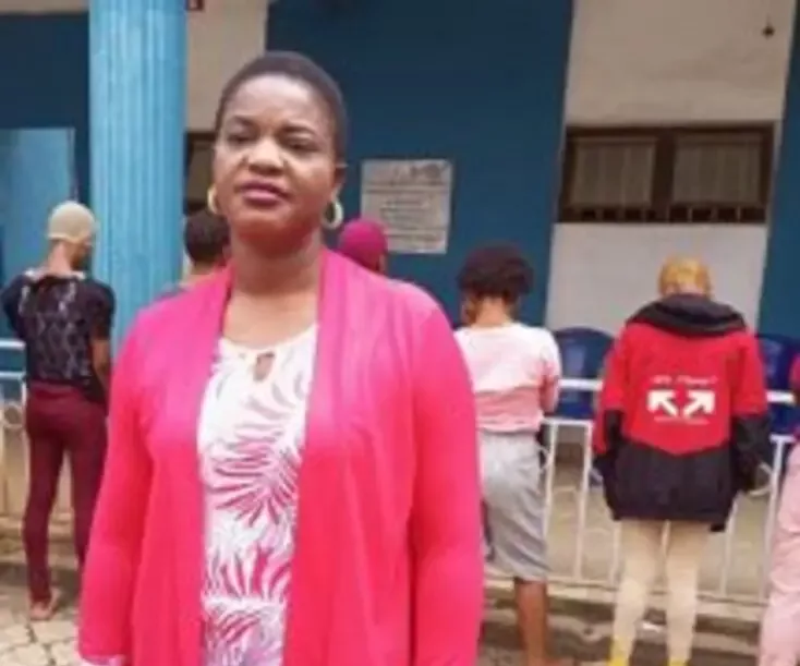 Mrs Chidiebere Oruruo-Ifudu, Zonal Commander, NAPTIP, Benin Zonal Command and the arrested girls at the background