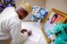 The Speaker, Lagos State House of Assembly, Mr Mudashiru Obasa, signing a condolence register at the residence of the late Prof. Tunde Samuel in Lagos on Thursday