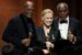 Actors Samuel L. Jackson, Liv Ullmann and Danny Clover pose after accepting their honorary Oscars