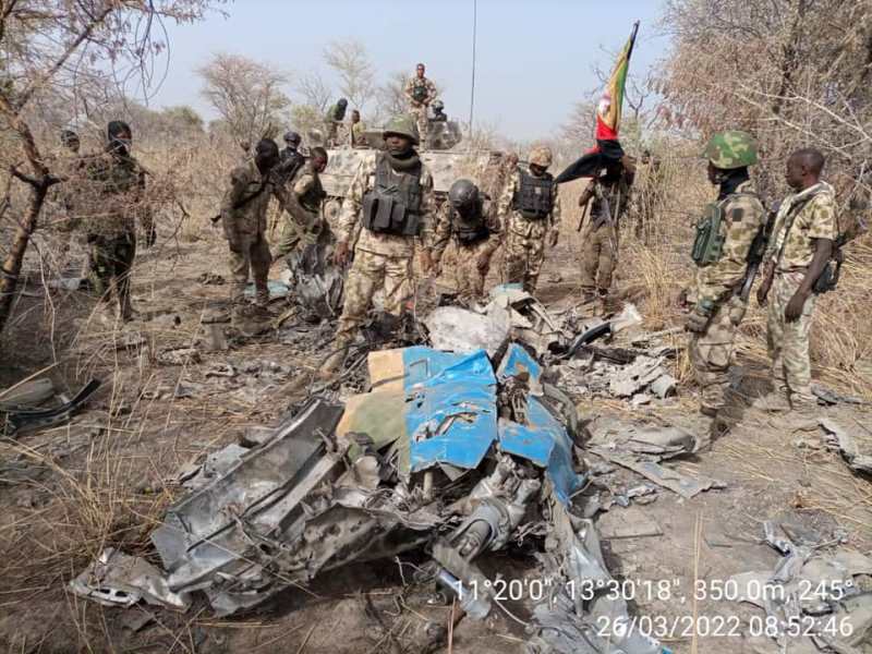 Troops with the wreckage of the aircraft