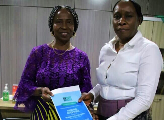 Mrs Henrietta Yakubu, right with her successor Faithful Hope-Ivbaze