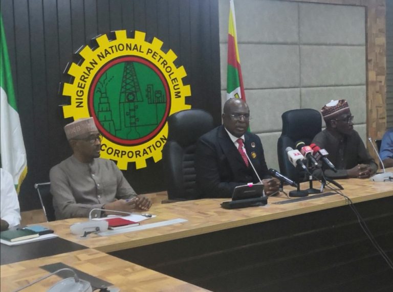 Oil minister Timipre Sylva, middle at a press briefing in Abuja