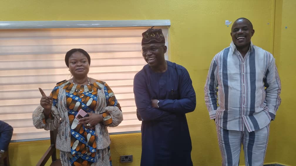 Mrs Adejoke Orelope-Adefulire (left), Senator Tokunbo Abiru (middle) and an official