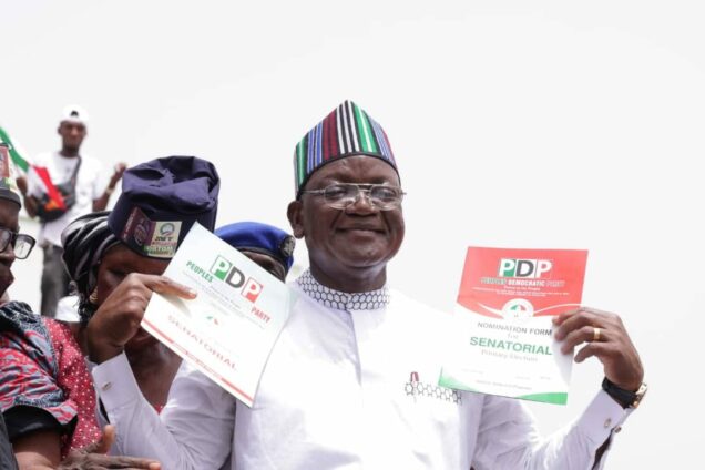 Benue governor, Samuel Ortom displaying the PDP Senate nomination form presented to him in Markurdi on Monday