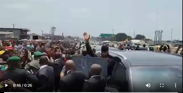 The vice president waving at the crowd