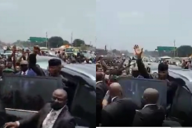 Osinbajo waving at the cheering crowd