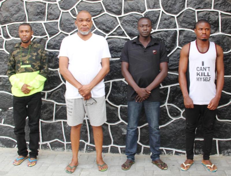 Osondu Igwilo, second left and the other accomplices arrested by EFCC