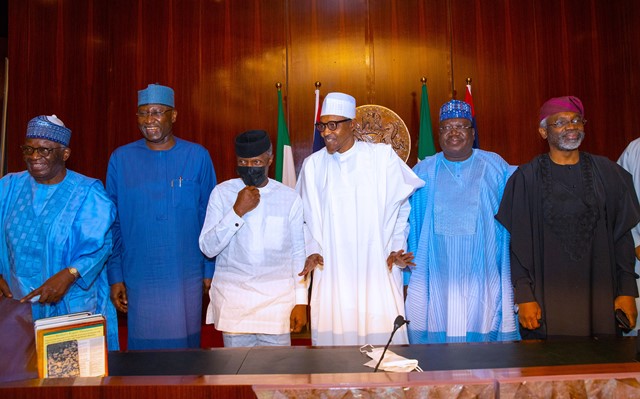 Buhari with others during the visit