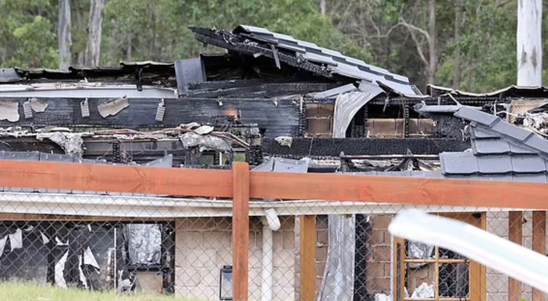 Stanley Obi's burned home in New Beith Brisbane Australia
