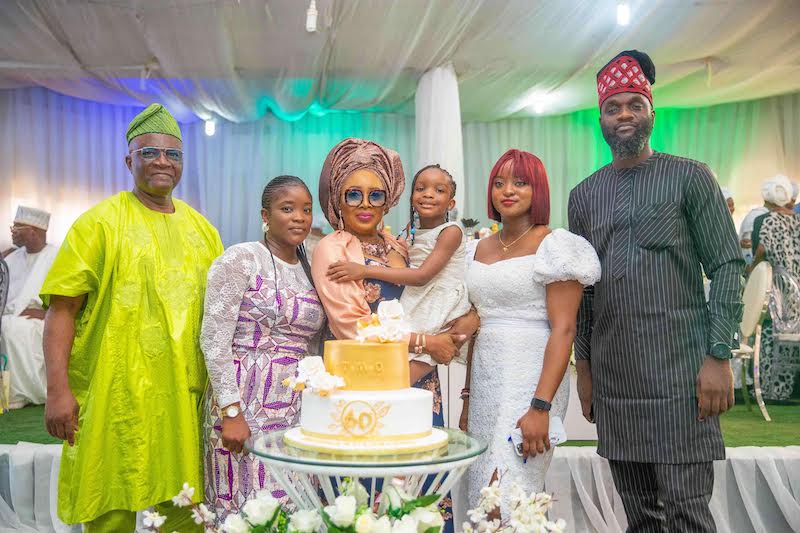 Toyin, holding Amal Oluwo, with her nieces Molade Oluwo and Molayo Emiola, brother-in-law, Femi Onanuga